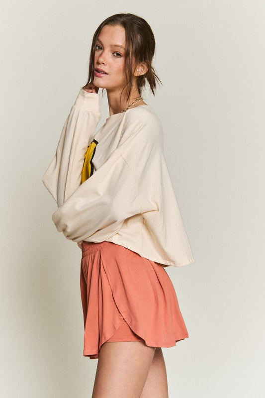 All Smiles Cropped Long Sleeve Top