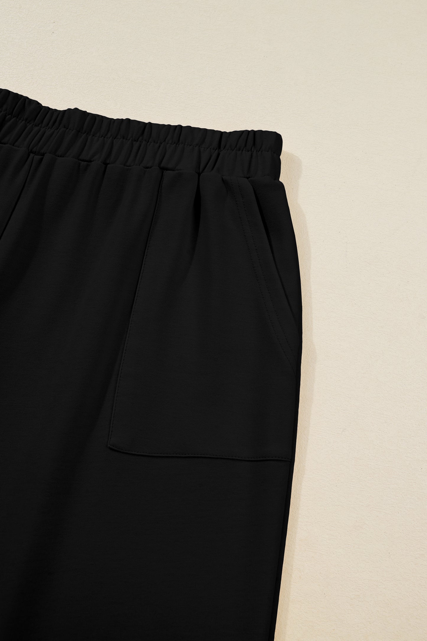 Black Plus Size Elastic Waist Asymmetrical Hem Loose Capris Pants