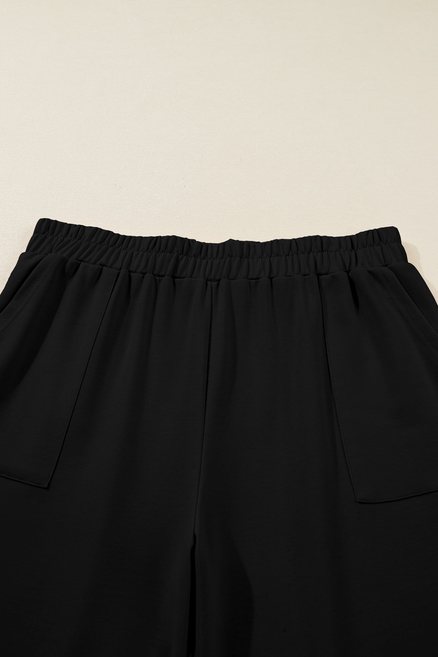 Black Plus Size Elastic Waist Asymmetrical Hem Loose Capris Pants